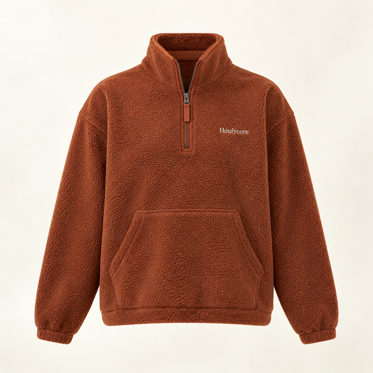 Houfycore Ember fleece half-zip in Rust, front view with high collar, pouch pocket and chest wordmark.