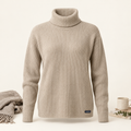 Houfycore Fjord ribbed turtleneck in Oatmeal, full front view with foldover collar and hem label.